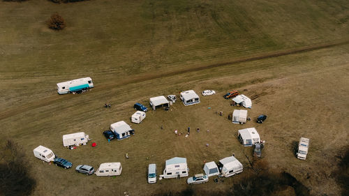 High angle view of cars on field