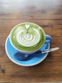 Close-up of coffee cup on table