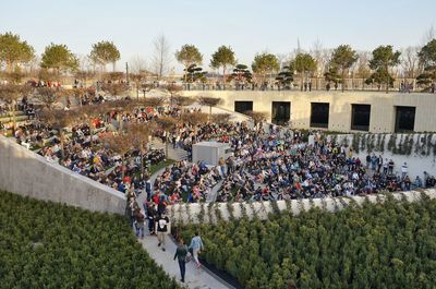 High angle view of people against plants in city