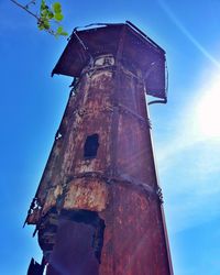 Low angle view of built structure against blue sky