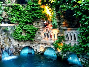 Arch bridge over water