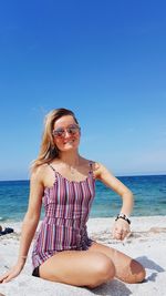 Woman walking on beach