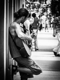 Young man playing outdoors