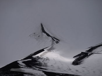 High angle view of snow covered landscape against sky