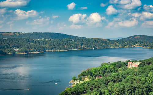 Serene lake with mountain background at day from top angle