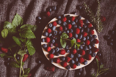 High angle view of strawberries on table