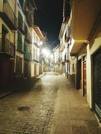 Narrow alley with buildings in background