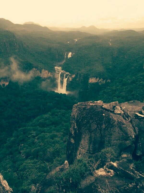 mountain, scenics, tranquil scene, beauty in nature, tranquility, landscape, nature, high angle view, non-urban scene, mountain range, physical geography, idyllic, geology, rock - object, remote, rock formation, water, travel destinations, tourism, cliff