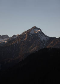 Scenic view of mountains against clear sky