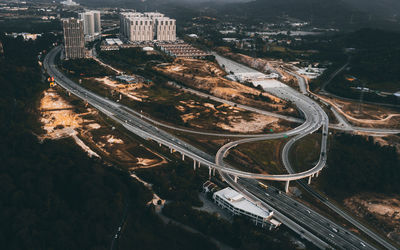 Aerial view of new developed town next to the highway toll exit in selangor, malaysia.