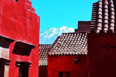 Red houses against sky