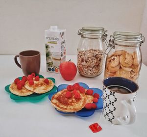 Close-up of breakfast served on table