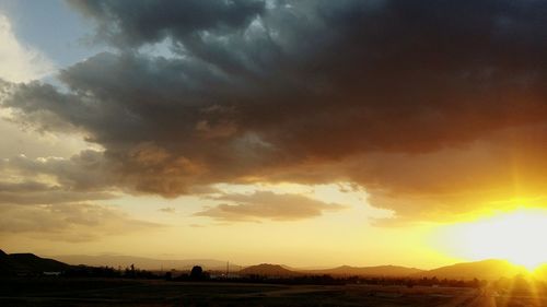 Sun shining through clouds