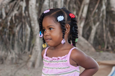 Portrait of cute girl looking away