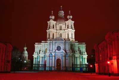 View of illuminated temple at night