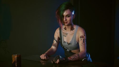 Young woman sitting on table