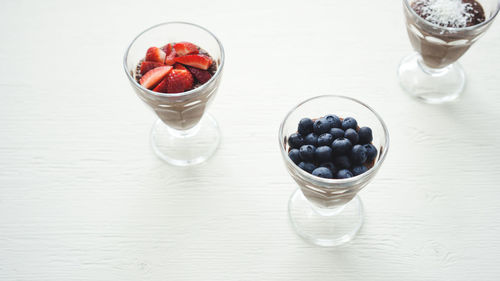 High angle view of fruits in glass on table