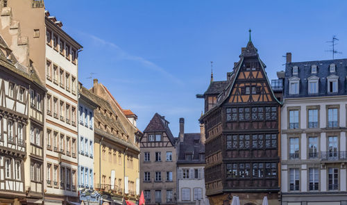 Low angle view of buildings against clear sky