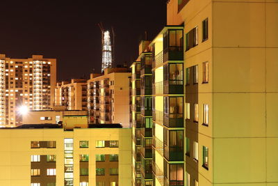 Buildings in city at night