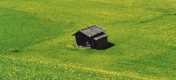 High angle view of small house on field