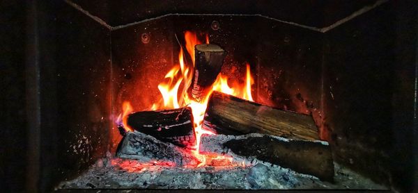 Close-up of fire burning in wood