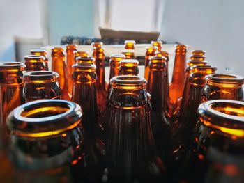 Close-up of brown bottles