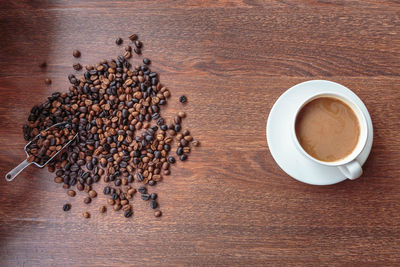 High angle view of coffee cup on table