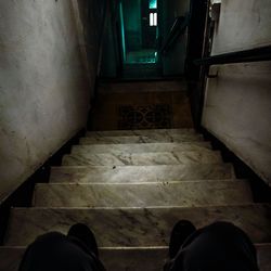 Low section of person on staircase