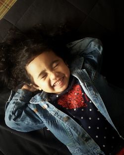 High angle view of smiling boy