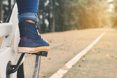 Foot of a woman on bicycle