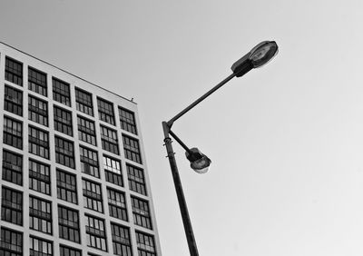 Low angle view of street light against sky