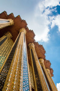 Low angle view of temple against blue sky