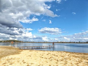 Scenic view of beach against sky