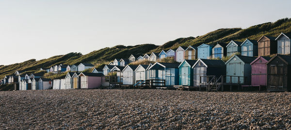 Beach huts against sky