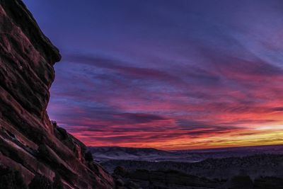 Scenic view of mountains against sky during sunset