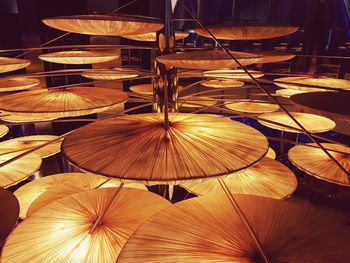 Close-up of illuminated lamps on table