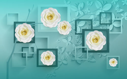 High angle view of white roses on table