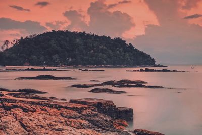 Scenic view of sea against sky during sunset