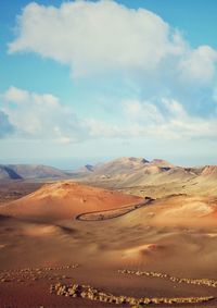 Scenic view of desert against sky