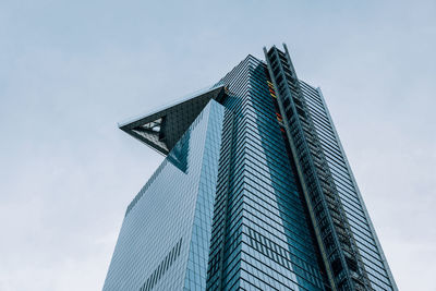 Low angle view of modern building against sky