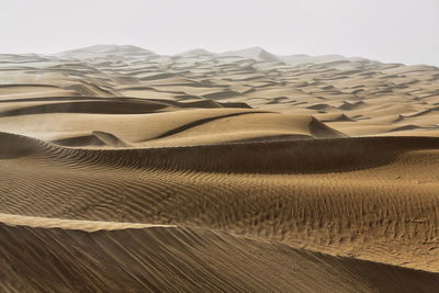 Scenic view of desert against sky