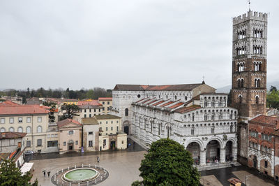 Buildings in city against sky