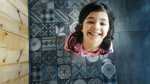High angle view of smiling young girl