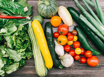 High angle view of tomatoes and vegetables