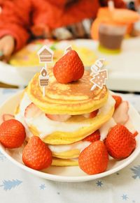 Close-up of strawberries in plate on table