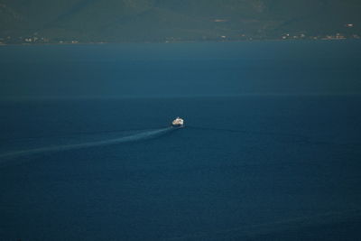 Scenic view of sea against blue sky