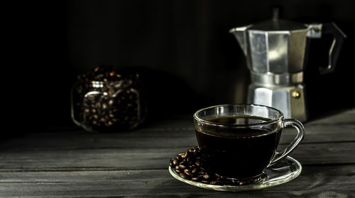 Close-up of coffee cup on table