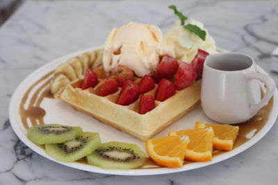 Close-up of food in plate on table