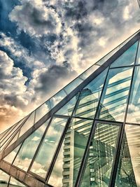 Low angle view of bridge against sky in city