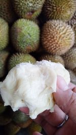 Close-up of hand holding ice cream